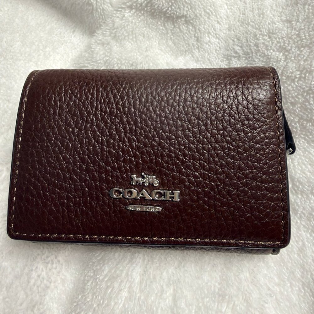 Brand new, never used Coach micro wallet.  CM238 in maple